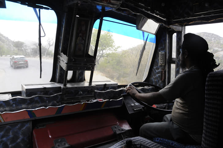 Friendly truck driver let our photographer ride with him in the truck.